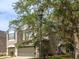 Exterior view of a two-story home, showcasing its architectural style, landscaping, and curb appeal at 10121 Westpark Preserve Blvd # 10121, Tampa, FL 33625