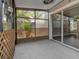 Enclosed lanai with lattice detail, perfect for enjoying the outdoors in comfort at 10121 Westpark Preserve Blvd # 10121, Tampa, FL 33625