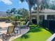 Lounge by the pool with outdoor patio furniture, lush tropical landscaping and ample seating at 10121 Westpark Preserve Blvd # 10121, Tampa, FL 33625