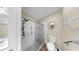 Bathroom features a sleek glass shower, modern fixtures, and neutral-toned walls at 1016 Mcdaniel St, Sun City Center, FL 33573