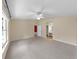 Spacious bedroom with a ceiling fan, and neutral paint, offering a bright and airy feel at 1016 Mcdaniel St, Sun City Center, FL 33573