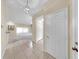 Welcoming foyer with tile flooring and an open view to the living area at 1016 Mcdaniel St, Sun City Center, FL 33573