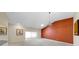 Bright open-concept living room with large windows and vaulted ceilings at 1016 Mcdaniel St, Sun City Center, FL 33573