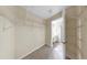 Walk-in closet offers ample storage with shelving, and access to the bathroom at 1016 Mcdaniel St, Sun City Center, FL 33573
