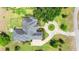 Expansive property featuring manicured landscaping, fenced yard, and circular driveway at 10614 Low Oak Terrace, Thonotosassa, FL 33592