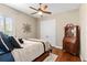Comfortable bedroom with a window view and a secretary desk at 10614 Low Oak Terrace, Thonotosassa, FL 33592