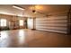Spacious three-car garage offers ample parking and storage at 10614 Low Oak Terrace, Thonotosassa, FL 33592