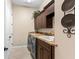 The laundry room features modern appliances and custom cabinetry at 10614 Low Oak Terrace, Thonotosassa, FL 33592