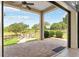 Enjoy the outdoors with this spacious patio with stone flooring and stunning nature views at 10614 Low Oak Terrace, Thonotosassa, FL 33592