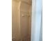 Cozy bathroom featuring white tiled walls, a towel rack, and a classic design at 1155 Royalwood Dr, Holiday, FL 34690