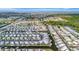 Aerial view of a waterfront community offering canal access and stunning scenery at 119 E Saint Johns Way, Apollo Beach, FL 33572