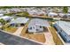 Aerial view of a home featuring a metal roof, a car port, and waterfront views at 119 E Saint Johns Way, Apollo Beach, FL 33572