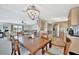 Open-concept layout showing the dining room connecting to the kitchen and living room for easy entertaining at 119 E Saint Johns Way, Apollo Beach, FL 33572