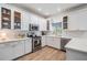 Well-lit kitchen with ample counter space, stainless appliances, and modern cabinetry at 12712 Stanwyck Cir, Tampa, FL 33626
