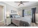 Comfortable bedroom with ceiling fan, window, nightstand, and relaxing decor at 1322 Idlewild Dr, Clearwater, FL 33755