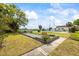 Bocce ball court with well-maintained landscaping and benches for seating at 1666 S Lake Ave # 1, Clearwater, FL 33756