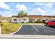 Charming home exterior with manicured lawns, lovely landscaping, and convenient parking at 1666 S Lake Ave # 1, Clearwater, FL 33756