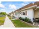Charming home exterior with well-kept lawns, neat landscaping, and a welcoming entrance at 1666 S Lake Ave # 1, Clearwater, FL 33756