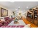 Spacious living room with wood floors, decorative sofa, and recessed lighting at 1666 S Lake Ave # 1, Clearwater, FL 33756
