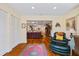 Inviting living room with hardwood floors, comfortable seating, and seamless transition to other rooms at 1666 S Lake Ave # 1, Clearwater, FL 33756