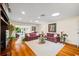 Bright living room featuring hardwood floors, recessed lighting, and comfortable seating at 1666 S Lake Ave # 1, Clearwater, FL 33756
