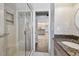 Bright, renovated bathroom featuring walk in shower and tiled floor at 17 Bellevue Dr, Treasure Island, FL 33706