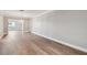 Spacious living area with wood flooring and crown molding accents at 17 Bellevue Dr, Treasure Island, FL 33706