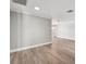 Living room features recessed lighting, crown molding, and new wood floors at 17 Bellevue Dr, Treasure Island, FL 33706