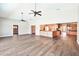 Spacious living room with vaulted ceilings, wood floors, and open floor plan at 17 Bellevue Dr, Treasure Island, FL 33706