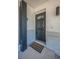 Close up of front door featuring welcome mat at 1710 Hibiscus N Cir, Oldsmar, FL 34677