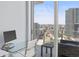 Bright home office space with balcony overlooking stunning city views and high-rise buildings at 175 1St S St # 2603, St Petersburg, FL 33701
