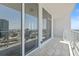Spacious balcony offering expansive city skyline views from a modern condo in a prime location at 175 1St S St # 2603, St Petersburg, FL 33701