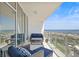 Balcony seating arrangement highlighting the beautiful ocean views from this condominium at 175 1St S St # 2603, St Petersburg, FL 33701