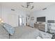 Enjoy this bedroom with large TV, great lighting, ceiling fan, and hardwood floors at 175 1St S St # 2603, St Petersburg, FL 33701