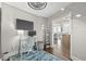 This bedroom features hardwood floors, a ceiling fan, and plenty of light at 175 1St S St # 2603, St Petersburg, FL 33701