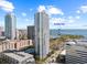 Scenic exterior shot of a modern high-rise condo in a bustling urban environment, near the St Pete Pier at 175 1St S St # 2603, St Petersburg, FL 33701
