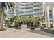 Contemporary condo entrance with palm trees and manicured landscaping at 175 1St S St # 2603, St Petersburg, FL 33701