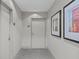 Hallway of condo with neutral color palette and carpeted floors at 175 1St S St # 2603, St Petersburg, FL 33701