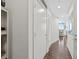 Condo hallway featuring hardwood floors and sleek doors at 175 1St S St # 2603, St Petersburg, FL 33701