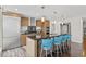 Contemporary kitchen with sleek cabinetry, stainless steel appliances, and a functional island with seating at 175 1St S St # 2603, St Petersburg, FL 33701