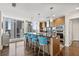 Gourmet kitchen with sleek cabinetry, stainless steel appliances, and a large island with counter seating at 175 1St S St # 2603, St Petersburg, FL 33701