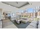 Bright and airy living room with large windows and comfortable seating arrangement overlooking the city at 175 1St S St # 2603, St Petersburg, FL 33701