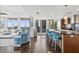Open-concept living room with bar seating, hardwood floors and city views at 175 1St S St # 2603, St Petersburg, FL 33701