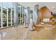 Grand lobby with marble floors, modern seating, and city views at 175 1St S St # 2603, St Petersburg, FL 33701