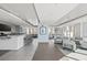 Spacious lounge with contemporary seating, a bar area, and floor-to-ceiling windows for ample natural light at 175 1St S St # 2603, St Petersburg, FL 33701
