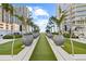 Scenic outdoor area with manicured lawn, decorative planters, and views at 175 1St S St # 2603, St Petersburg, FL 33701