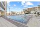 Beautiful outdoor swimming pool with clear water, lounge chairs, and surrounding city views at 175 1St S St # 2603, St Petersburg, FL 33701