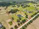 Sprawling acreage with estate home, barn, pool, meticulously bordered with red lines at 18423 Lithia Towne Rd, Lithia, FL 33547