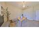 Neutral office space with natural light, traditional desk and neutral chair at 18423 Lithia Towne Rd, Lithia, FL 33547