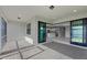 The covered patio features tiled flooring and sliding glass doors that open to the kitchen at 2541 Charter Oak Dr, North Port, FL 34289